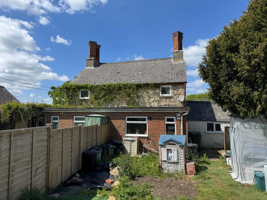 Lot: 102 - PAIR OF FREEHOLD COTTAGES IN A POPULAR VILLAGE LOCATION - Looking at the Rear of Cottage 1